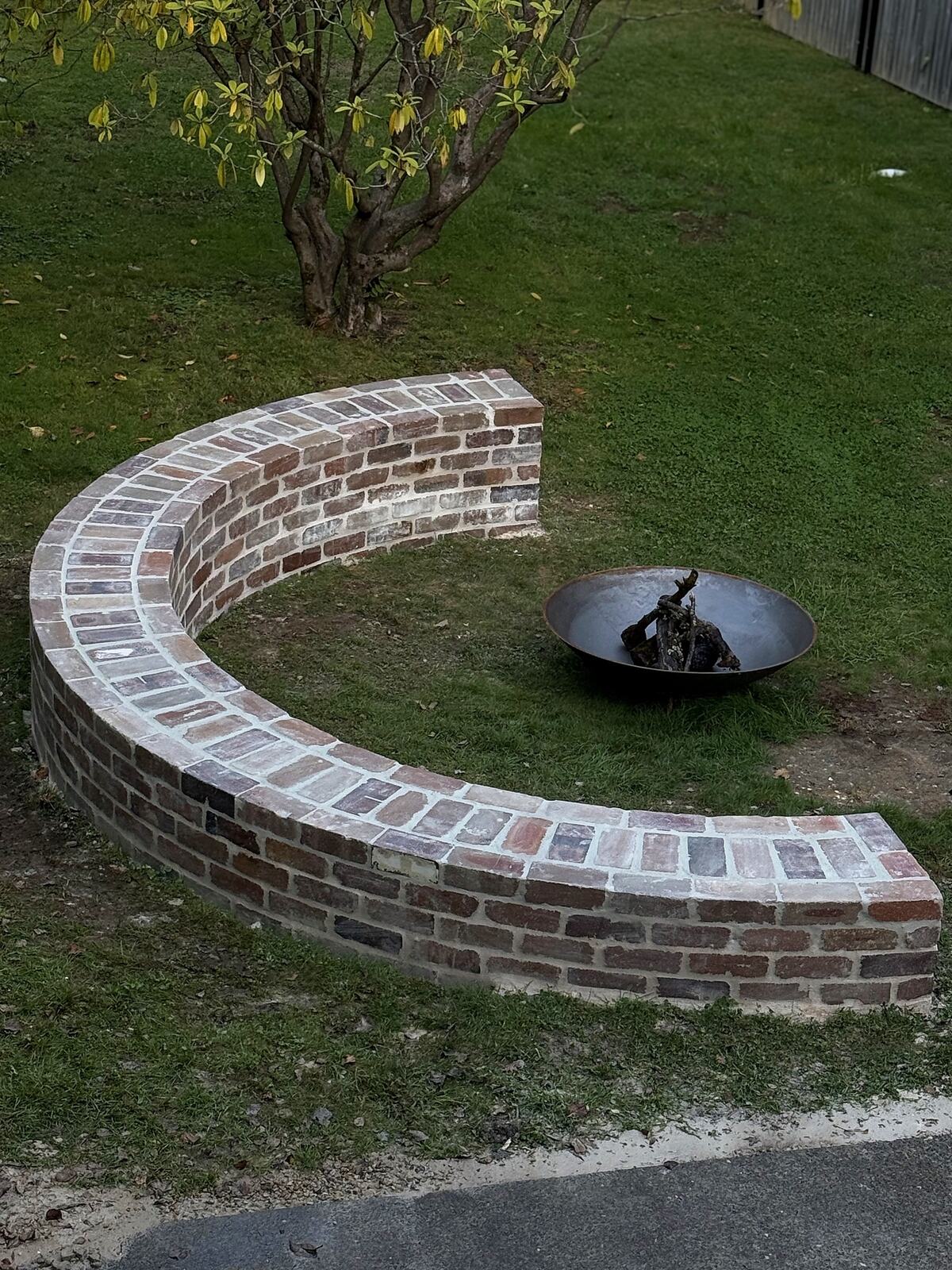 Brick fire pit wall